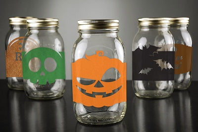 using vinyl and a Cricut or Silhouette machine, you can make these Halloween designs